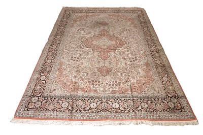 Lot 552 - A hand-knotted silk Persian Kashan carpet