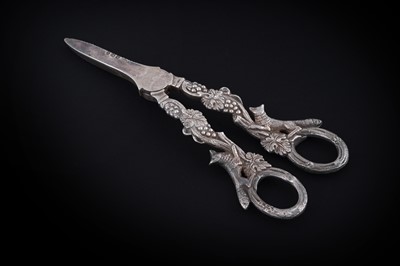Lot 223 - A pair of Elizabeth II silver grape shears with cast handles