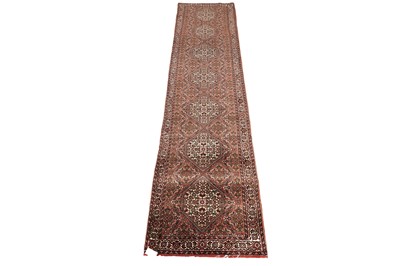 Lot 536 - A hand-knotted Persian Bidjar runner