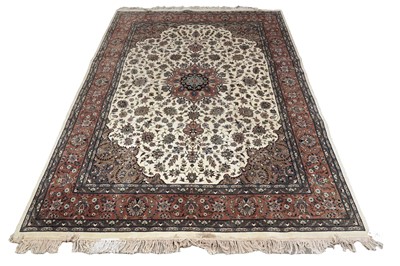 Lot 541 - A hand-knotted Persian Tabriz carpet