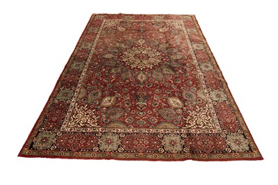 Lot 551 - A hand-knotted Persian Tabriz carpet