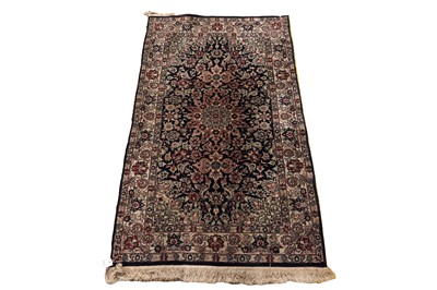 Lot 530 - A hand-knotted Persian Kirman rug