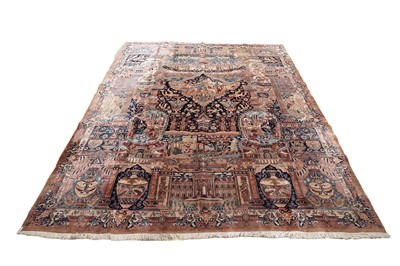Lot 563 - A hand-knotted Persian Kashan carpet