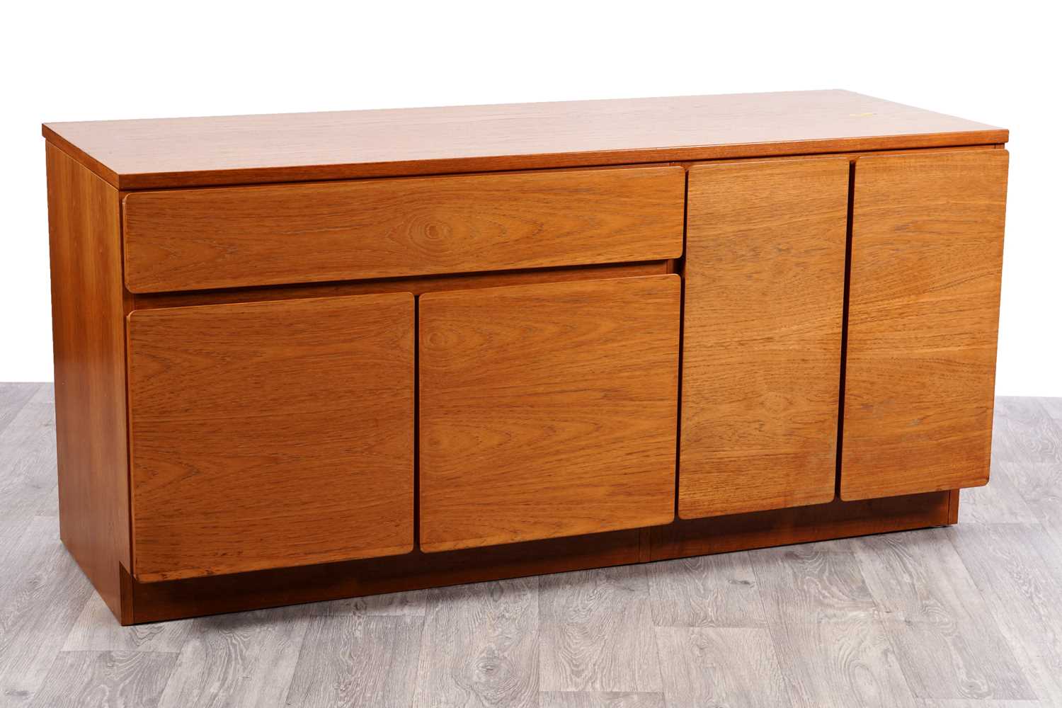 Lot 105 - Beaver and Tapley: a teak sideboard
