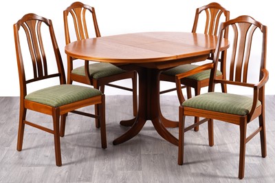 Lot 97 - Nathan: a teak extending circular dining table; and four chairs