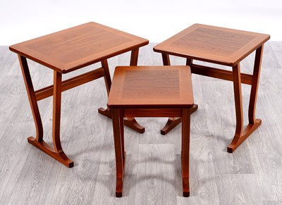 Lot 107 - A Nathan mid-Century nest of three teak tables