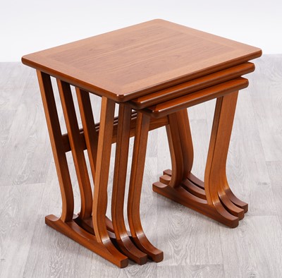 Lot 107 - A Nathan mid-Century nest of three teak tables