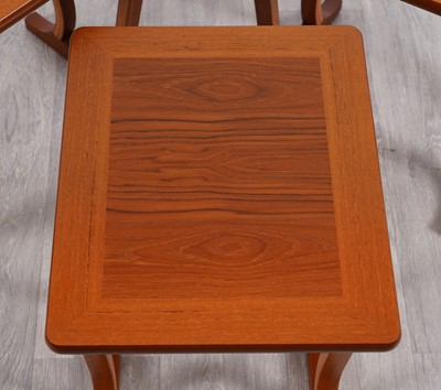 Lot 107 - A Nathan mid-Century nest of three teak tables