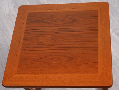 Lot 107 - A Nathan mid-Century nest of three teak tables