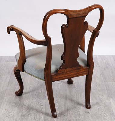 Lot 27 - An unusual George I-style walnut armchair
