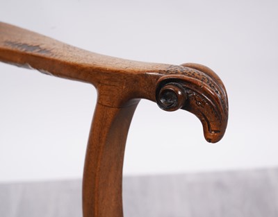 Lot 27 - An unusual George I-style walnut armchair