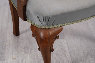 Lot 27 - An unusual George I-style walnut armchair