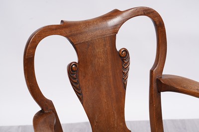 Lot 27 - An unusual George I-style walnut armchair