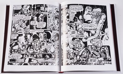 Lot 128 - Judge Dredd graphic novels and comics