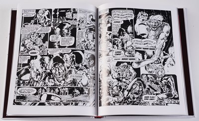 Lot 128 - Judge Dredd graphic novels and comics