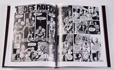 Lot 128 - Judge Dredd graphic novels and comics