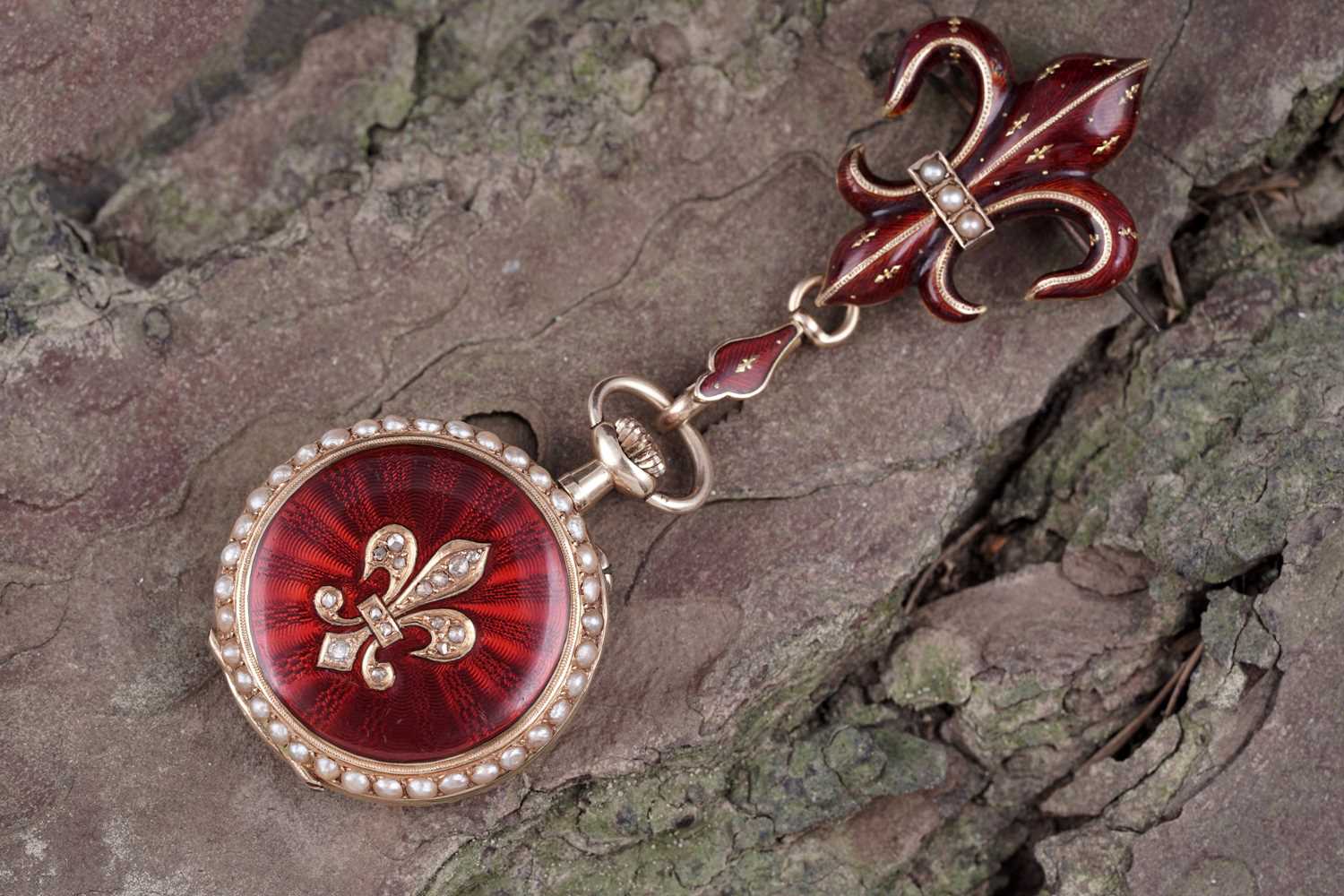 Lot 431 - Swiss 18k gold, enamel, diamond, and pearl set fob watch; and fleur-de-lys brooch fitting
