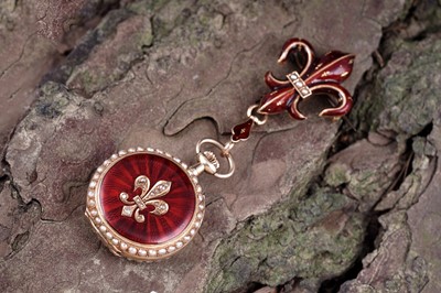 Lot 431 - Swiss 18k gold, enamel, diamond, and pearl set fob watch; and fleur-de-lys brooch fitting