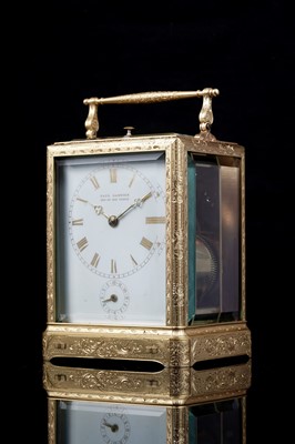 Lot 446 - Paul Garnier, Paris: a mid-19th Century engraved gilt brass musical and repeating carriage clock