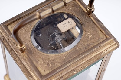 Lot 447 - A late 19th Century lacquered brass carriage alarm clock, retailed by C.J.Gaupp, Hong Kong