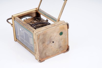 Lot 447 - A late 19th Century lacquered brass carriage alarm clock, retailed by C.J.Gaupp, Hong Kong