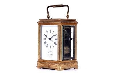 Lot 447 - A late 19th Century lacquered brass carriage alarm clock, retailed by C.J.Gaupp, Hong Kong