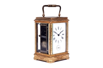 Lot 447 - A late 19th Century lacquered brass carriage alarm clock, retailed by C.J.Gaupp, Hong Kong