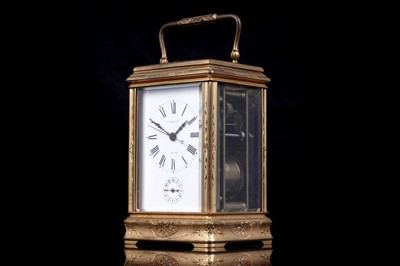 Lot 447 - A late 19th Century lacquered brass carriage alarm clock, retailed by C.J.Gaupp, Hong Kong