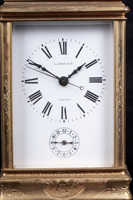 Lot 447 - A late 19th Century lacquered brass carriage alarm clock, retailed by C.J.Gaupp, Hong Kong