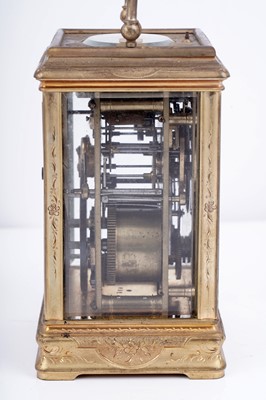 Lot 447 - A late 19th Century lacquered brass carriage alarm clock, retailed by C.J.Gaupp, Hong Kong