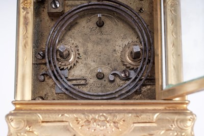 Lot 447 - A late 19th Century lacquered brass carriage alarm clock, retailed by C.J.Gaupp, Hong Kong