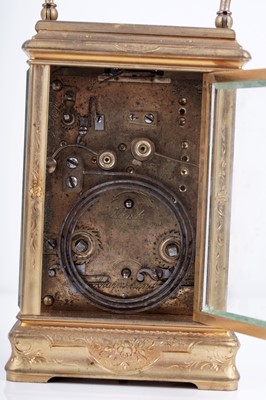Lot 447 - A late 19th Century lacquered brass carriage alarm clock, retailed by C.J.Gaupp, Hong Kong