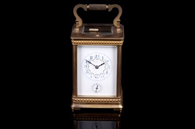 Lot 449 - A late 19th Century gilt brass cased carriage clock, retailed by Ullman et Cie