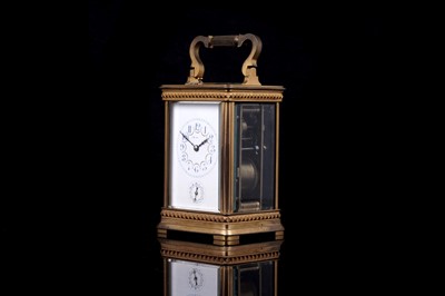 Lot 449 - A late 19th Century gilt brass cased carriage clock, retailed by Ullman et Cie
