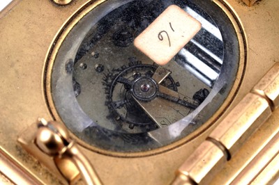 Lot 452 - A late 19th Century French gilt brass and champleve repeating carriage alarm clock