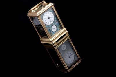 Lot 452 - A late 19th Century French gilt brass and champleve repeating carriage alarm clock