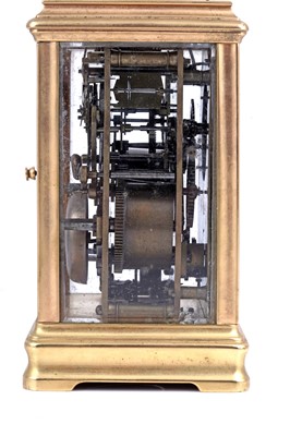 Lot 452 - A late 19th Century French gilt brass and champleve repeating carriage alarm clock