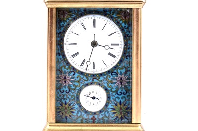 Lot 452 - A late 19th Century French gilt brass and champleve repeating carriage alarm clock