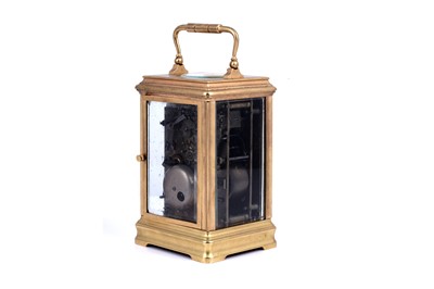 Lot 452 - A late 19th Century French gilt brass and champleve repeating carriage alarm clock
