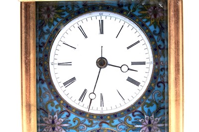 Lot 452 - A late 19th Century French gilt brass and champleve repeating carriage alarm clock