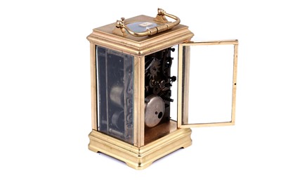 Lot 452 - A late 19th Century French gilt brass and champleve repeating carriage alarm clock