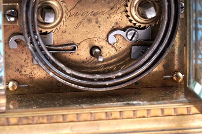 Lot 454 - A late 19th Century brass and champleve enamel petite sonnerie carriage clock