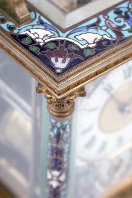 Lot 454 - A late 19th Century brass and champleve enamel petite sonnerie carriage clock
