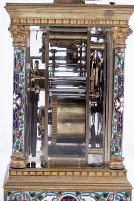 Lot 454 - A late 19th Century brass and champleve enamel petite sonnerie carriage clock