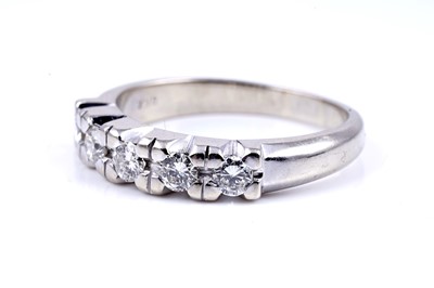 Lot 522 - A diamond five-stone half-hoop eternity ring