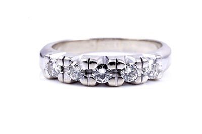 Lot 18 - A diamond five-stone half-hoop eternity ring