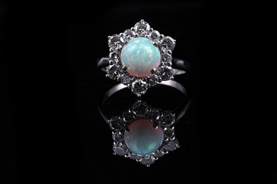 Lot 523 - An opal and diamond cluster ring