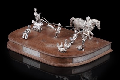 Lot 96 - A presentation group of Victorian silver peasant farm worker figures and farm animals