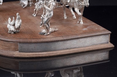 Lot 96 - A presentation group of Victorian silver peasant farm worker figures and farm animals