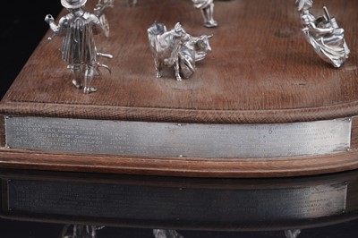 Lot 96 - A presentation group of Victorian silver peasant farm worker figures and farm animals